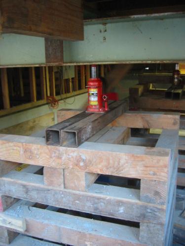 jack holding beam in place
