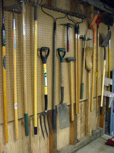 Garden tools on pegboard