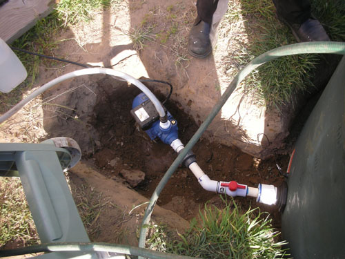 Pump attached to tank