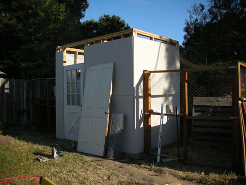 Chicken house with door and siding