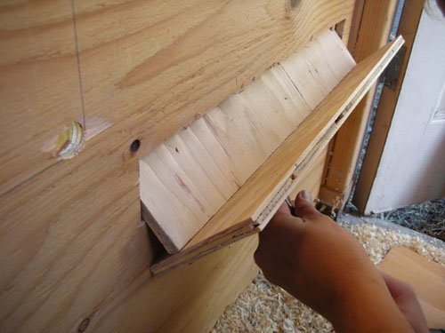 Attaching the lip in the chicken room