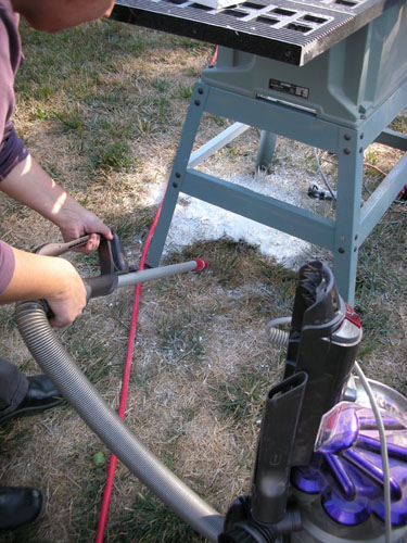 Vacuuming the lawn