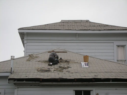 Removing shingles around the pipe