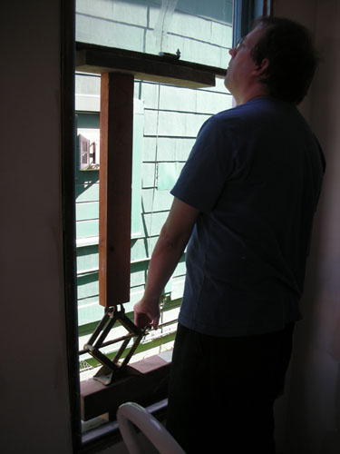 Pushing the upper sash into place