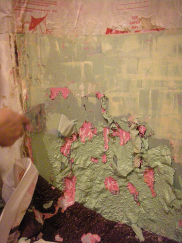 Paint peeling away from the niche