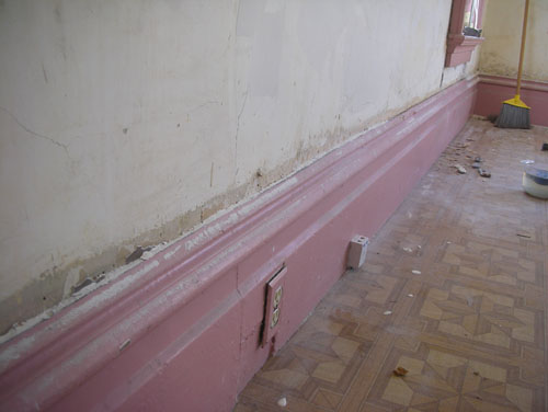 Plaster meets the baseboard