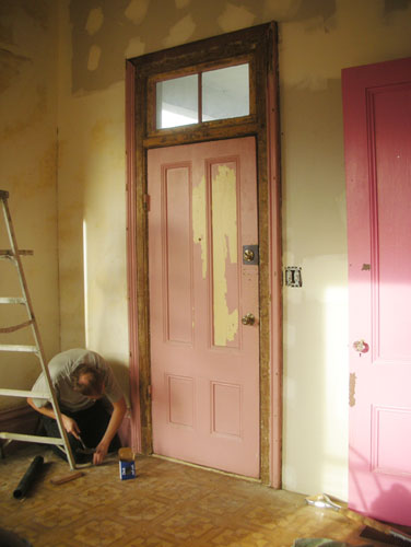 Reattaching the trim around the door