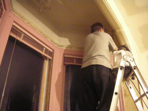 Stripping wallpaper from the bay