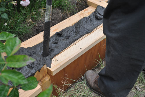 Vibrating the concrete into place