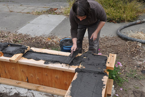 Screeding the top of the wall flat