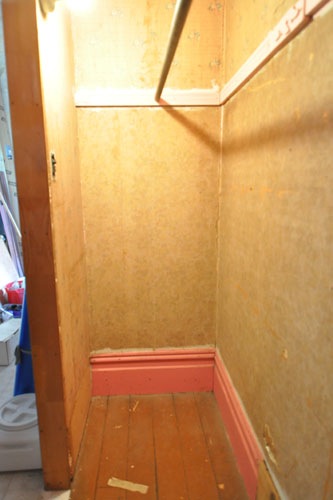 Downstairs bathroom, looking south, minus fake wood paneling