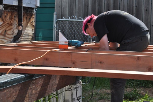 Noel at work screwing joists down