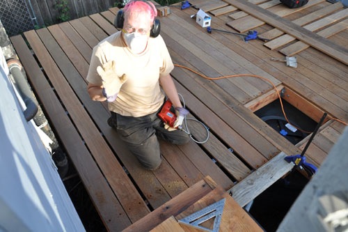 Putting boards down on the other side of the deck