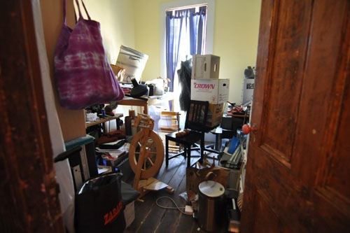 Accordion Room piled with junk