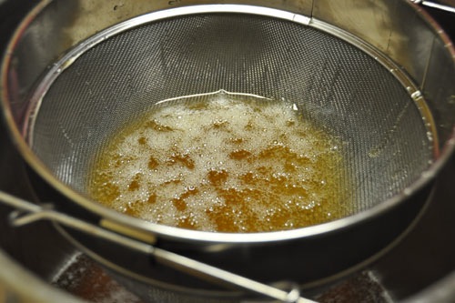 Honey straining in the sieve