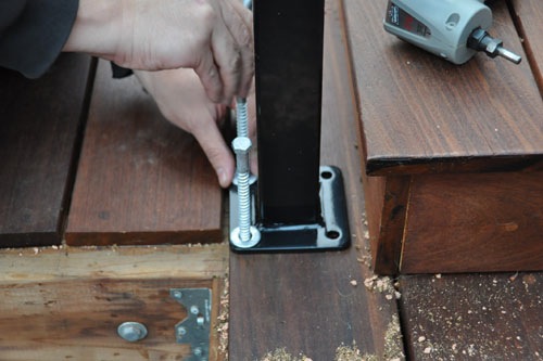 Setting the post in place with bolts