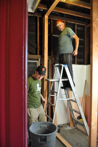 Noel and Tim building a wall