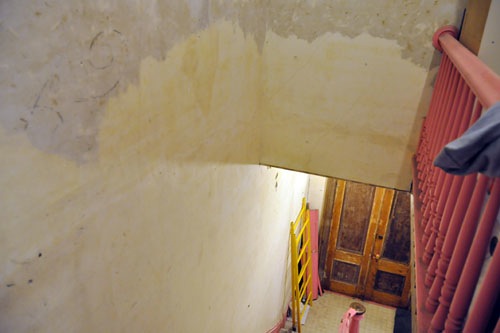 Paint removed above the stairs