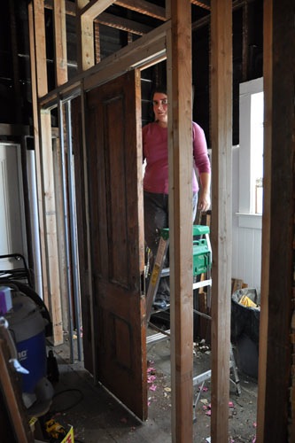 Bathroom door hanging in place