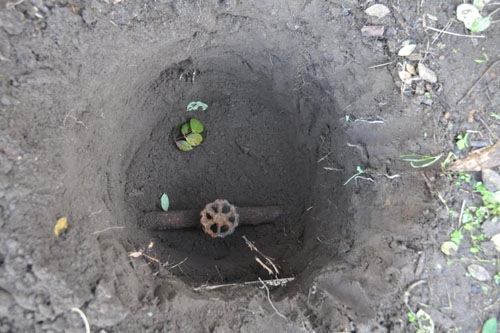 The mysterious pipe in our back yard