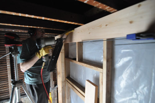 Getting the boards in place with the laser level