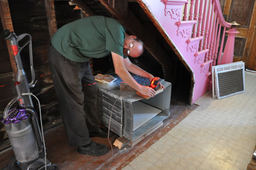 Using the laser level to see where the wall will be