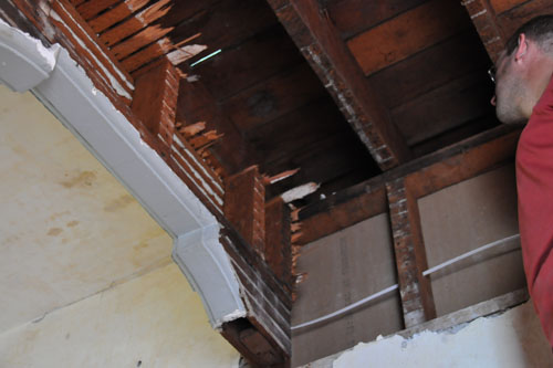 How to securely attach framing to this old house