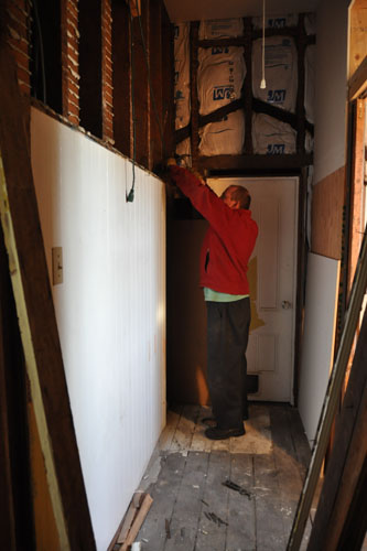 Taking off the wainscoating boards