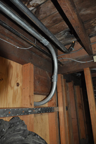 Conduit running to the basement subpanel and upstairs