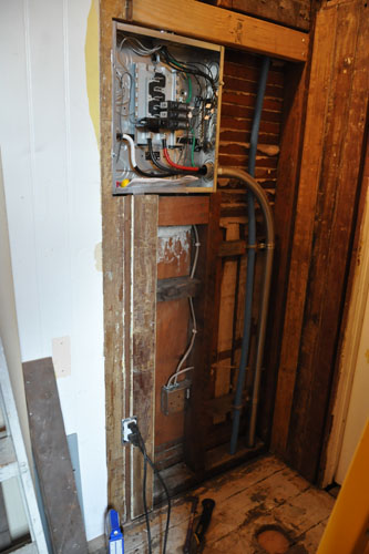 Paneling around the outlet and subpanel