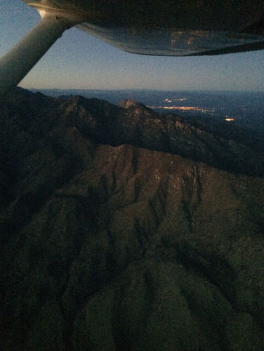 Flying around a mountain