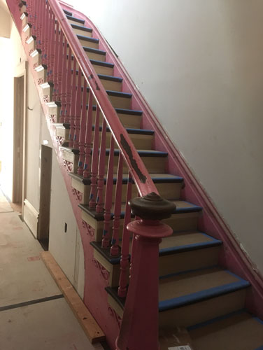 Front stair handrail in place