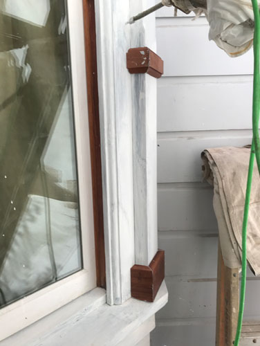 Adding trim pieces on at the kitchen bay window